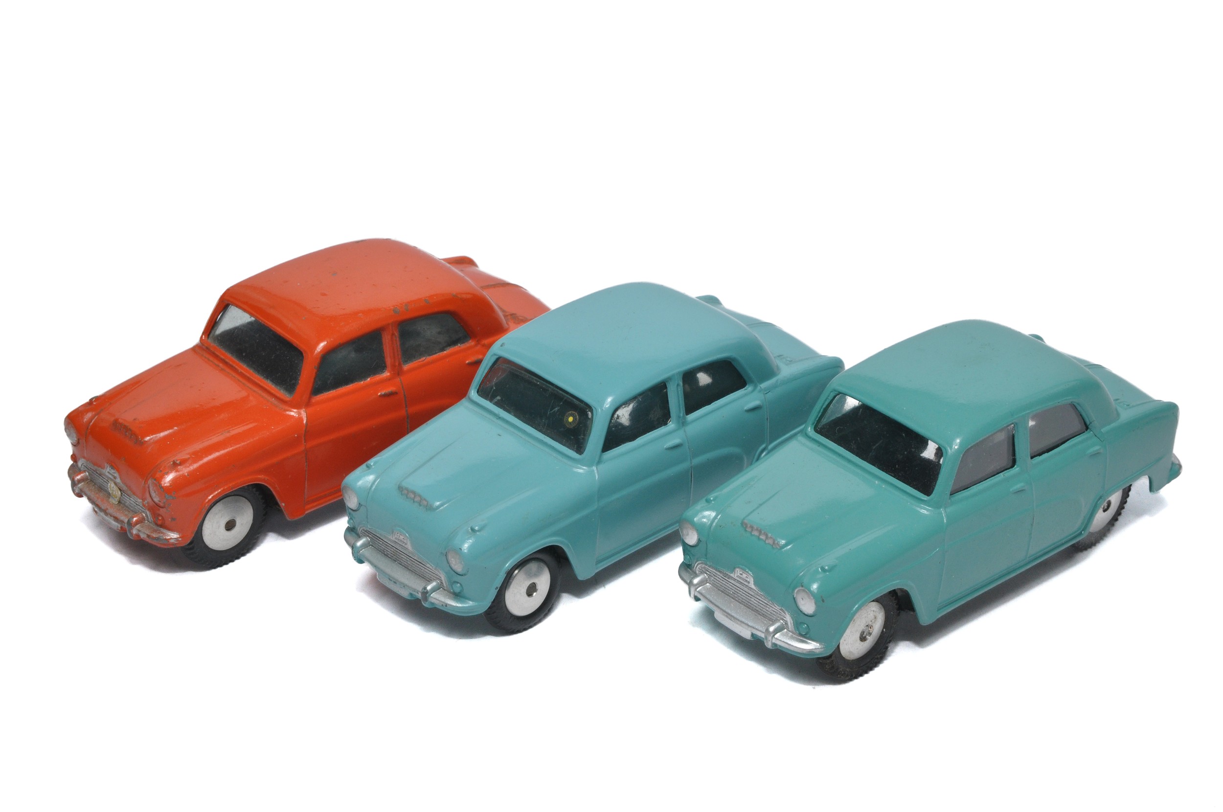 Corgi group of loose diecast issues comprising 3 x Austin Cambridge's in various colours. Red