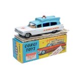 Corgi No. 437 Cadillac Superior Ambulance. Blue and White with brown interior. Cast hubs.