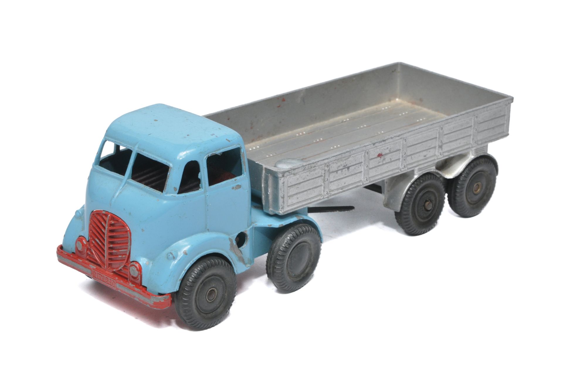 Mettoy Castoys mechanical articulated lorry. Light blue cab, with red grille, base & interior,