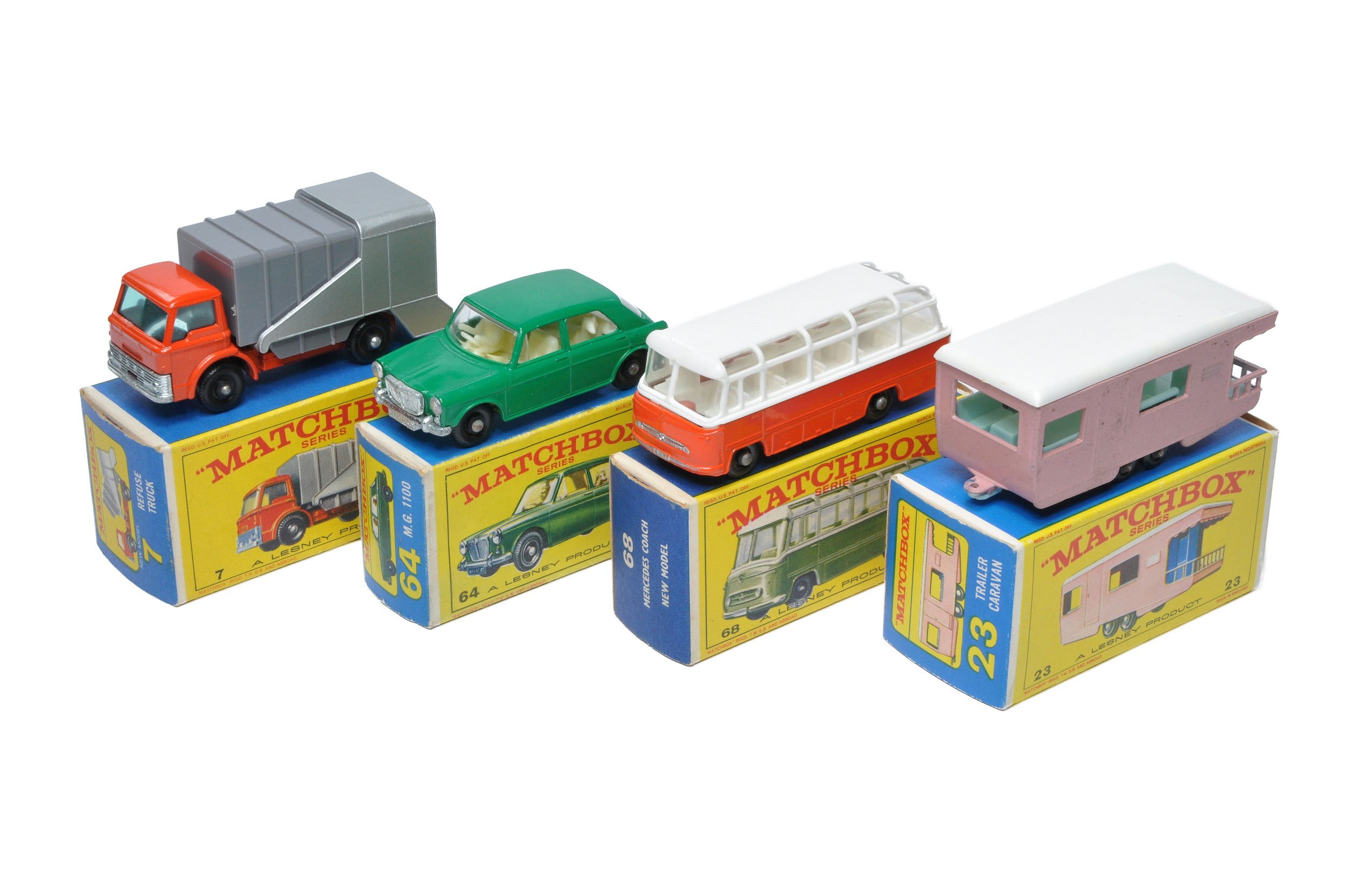 A group of four Matchbox Regular Wheels comprising MG1100, Refuse Truck, Trailer Caravan and