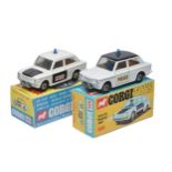 Corgi duo of No. 506 Police Panda Imp Car (Colour variations). Both display generally very good.