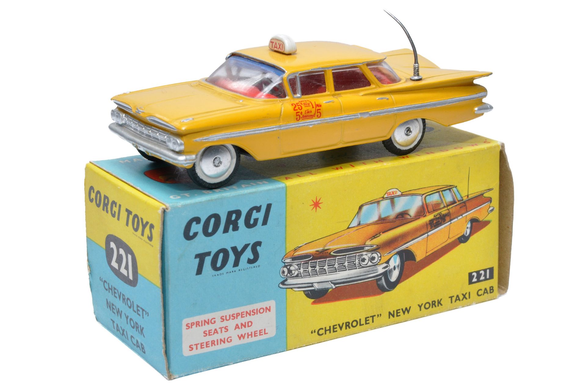 Corgi No. 221 Chevrolet New York Taxi Cab. Yellow / silver trim with red interior. Spun Hubs.