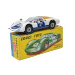 Corgi No. 330 Porsche Carrera 6. Blue and White with Black interior. Cast Hubs. Generally good. Some