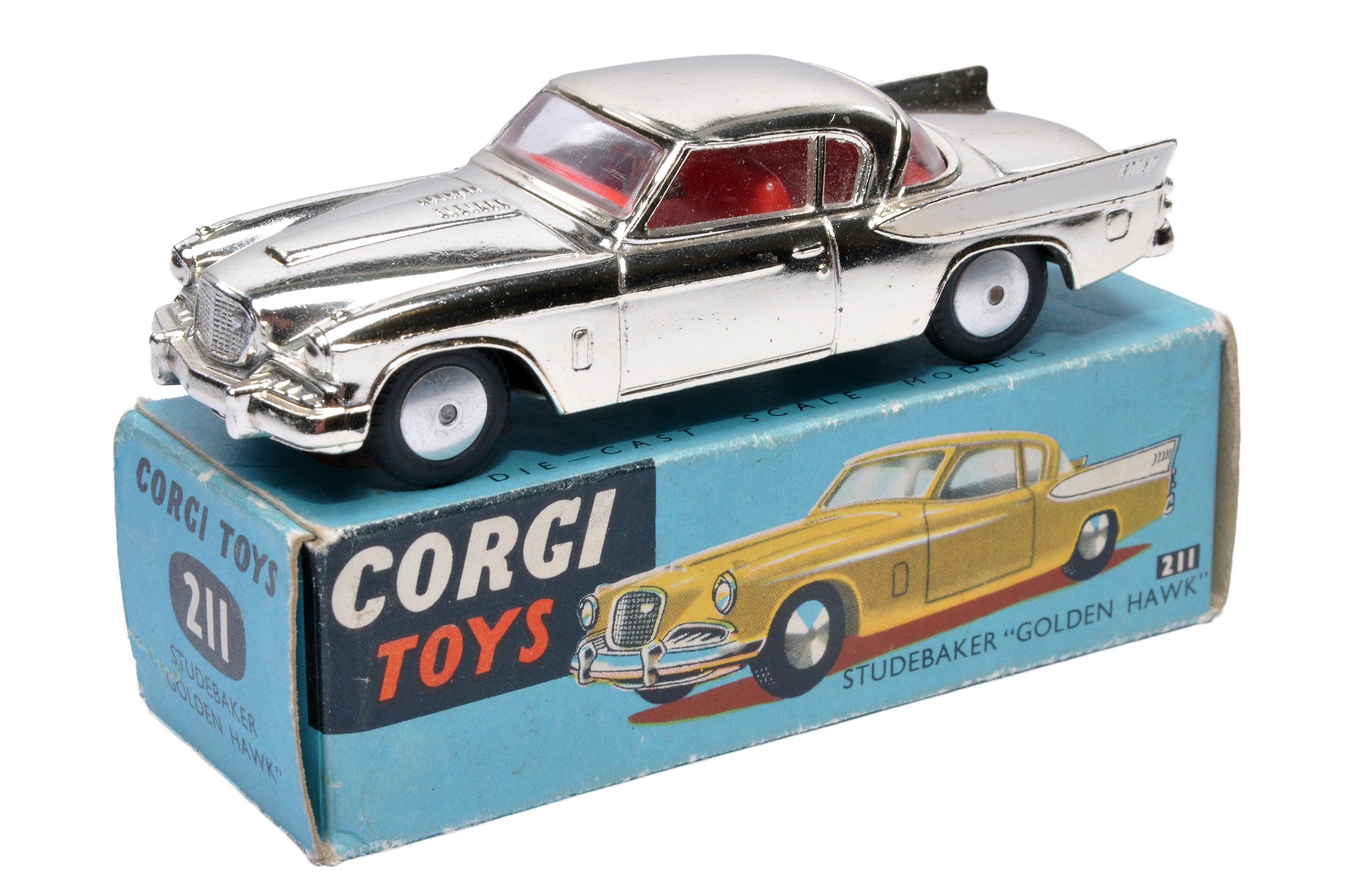 Corgi No. 211 Studebaker Golden Hawk. Gold plate / white flash with red interior. Flat spun hubs.