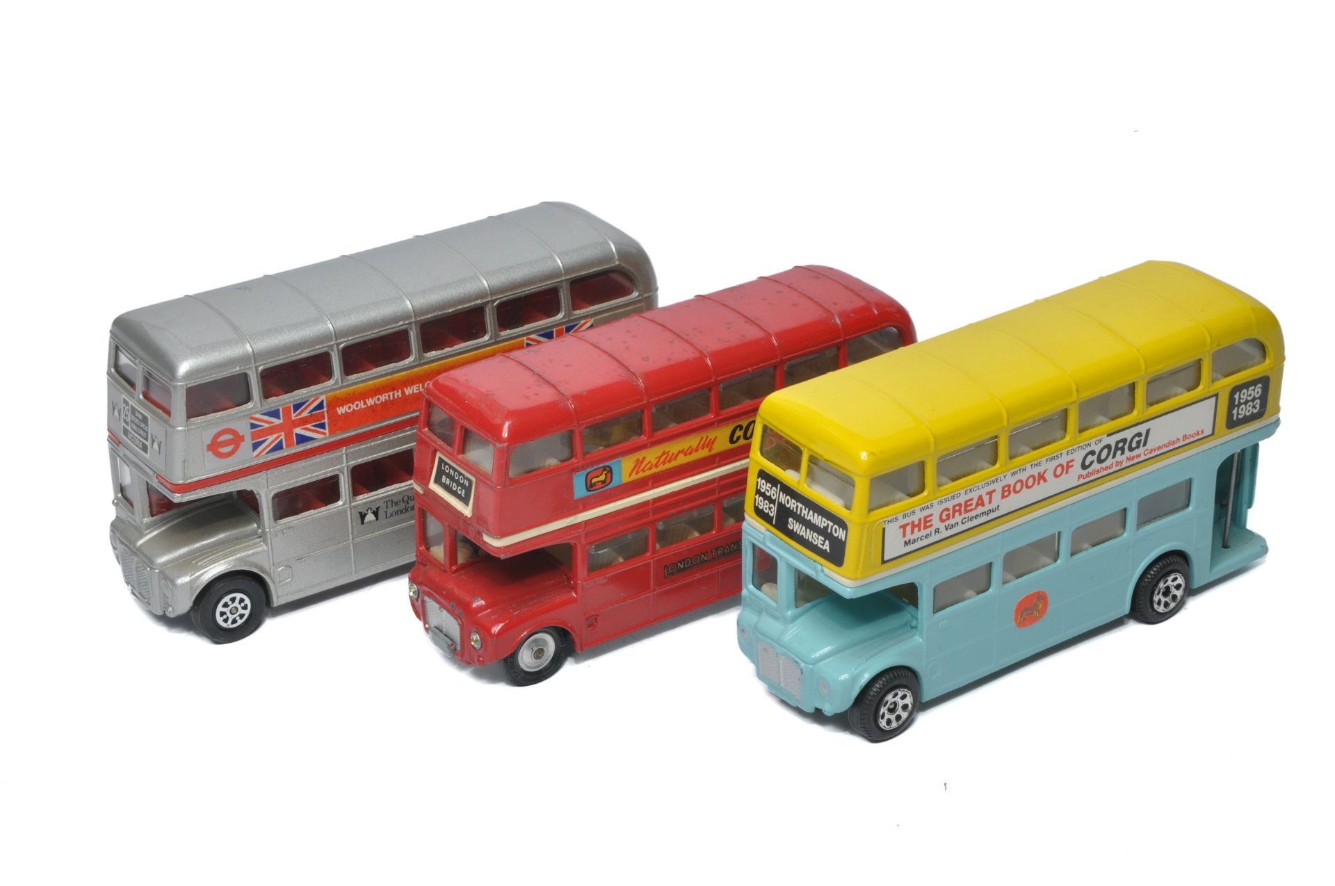 A trio of Corgi diecast double decker bus issues including limited edition 'Great book of Corgi'