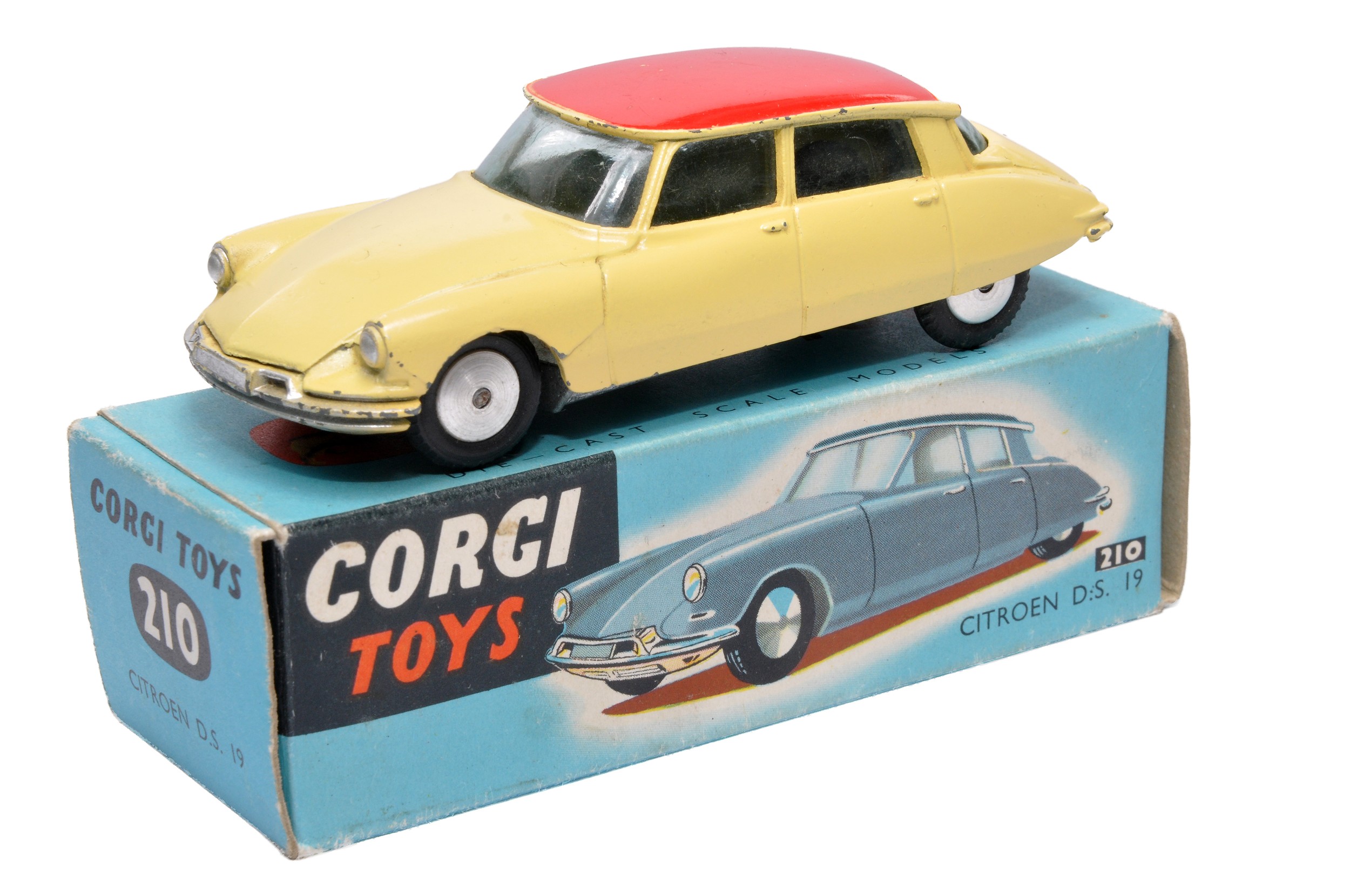 Corgi No. 210 Citroen DS19. Pale yellow / red. Flat spun hubs. Generally displays good to very good,