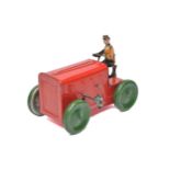 Greppert & Kelch German mechanical tinplate tractor and driver, 5" length. In good working order.