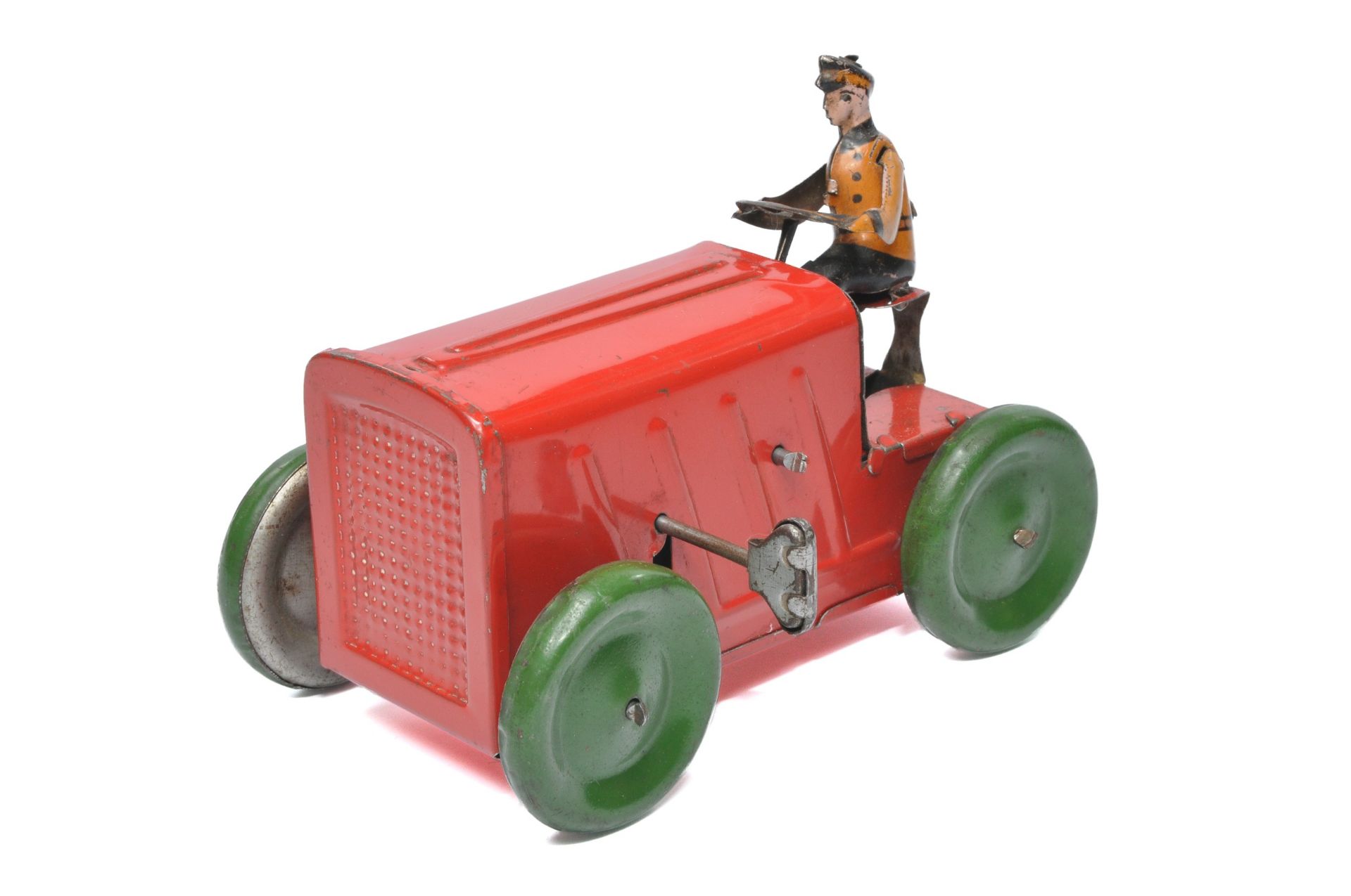 Greppert & Kelch German mechanical tinplate tractor and driver, 5" length. In good working order.