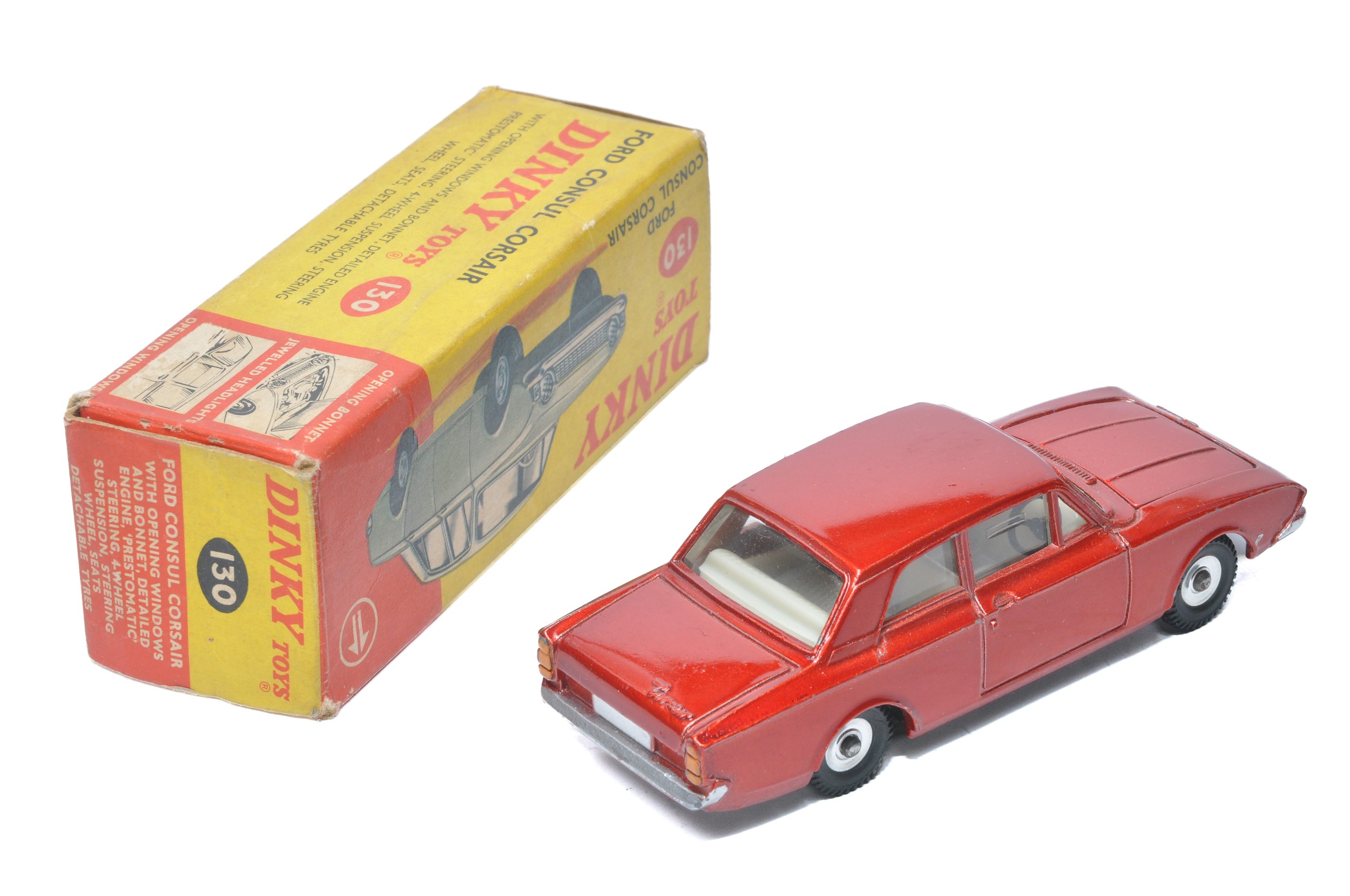 Dinky No. 130 Ford Consul Corsair. Metallic red with off-white interior. Displays very good with the - Image 2 of 2