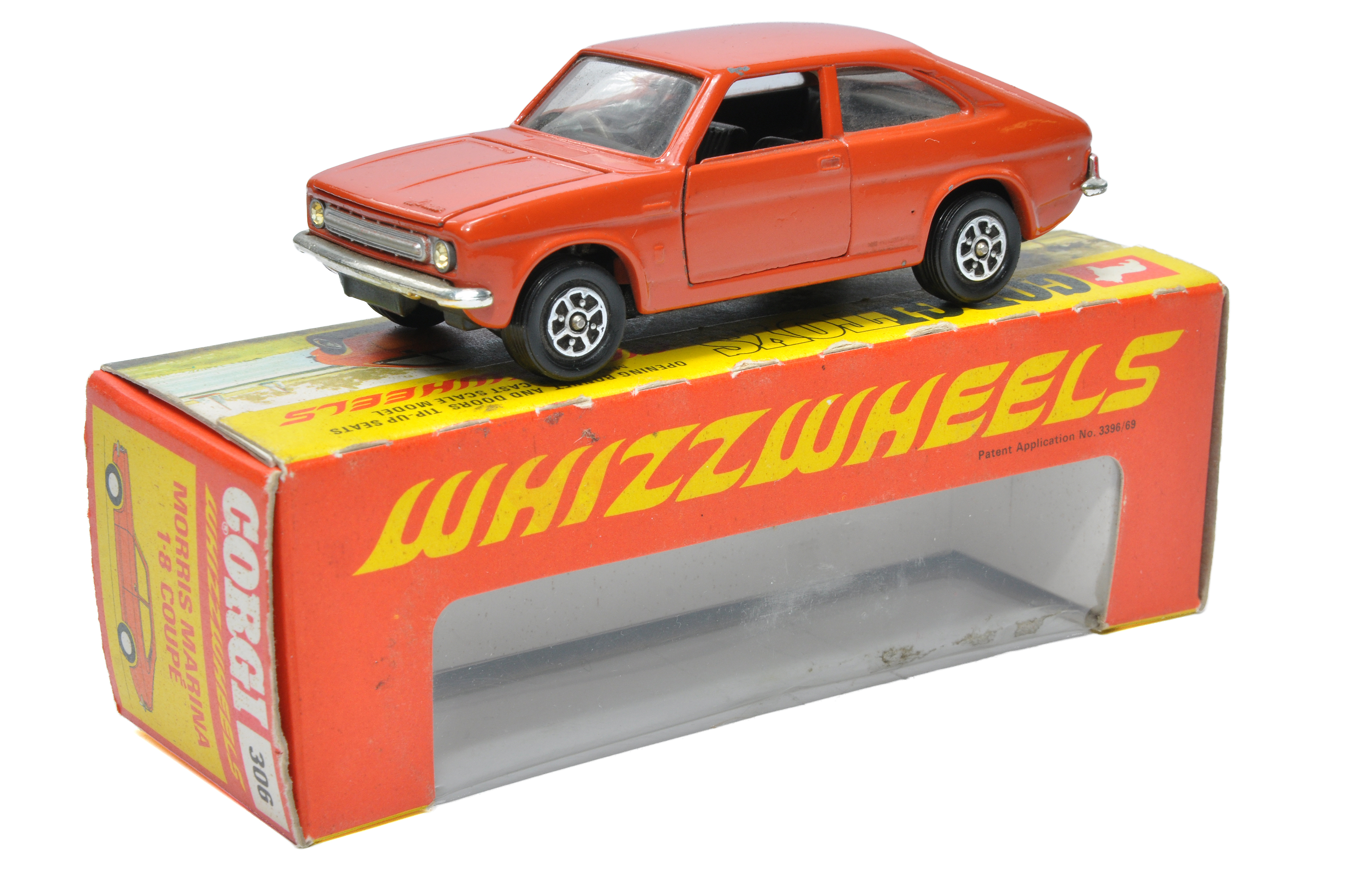 Corgi No. 306 Whizzwheels Morris Marina 1.8 Coupe. Brick Red with dark grey interior. Displays