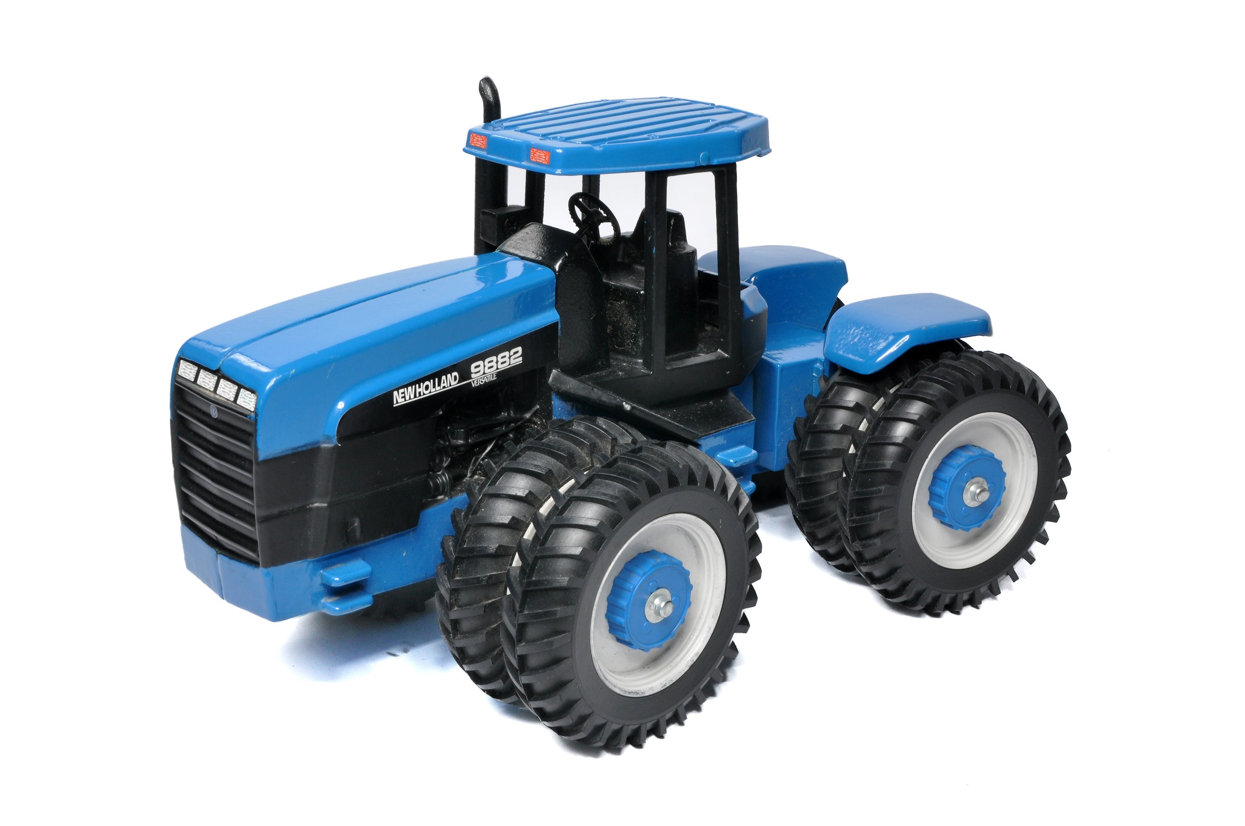 Scale Models 1/16 Diecast Farm Model issue comprising New Holland Versatile 9882 Tractor. Excellent.