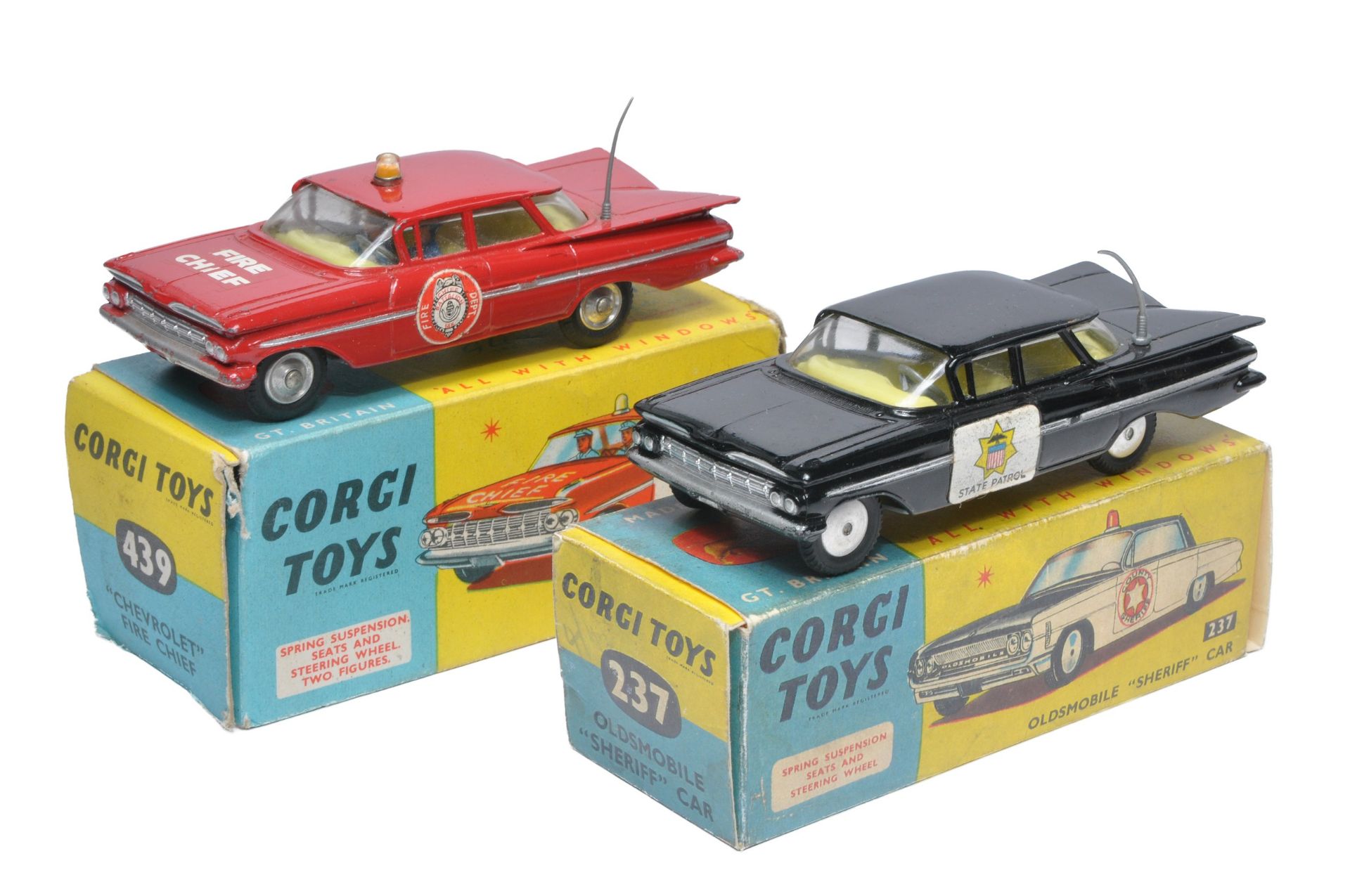 Corgi duo of No. 439 Chevrolet Fire Chief Car plus No. 237 Oldsmobile Sheriff Car. Both display