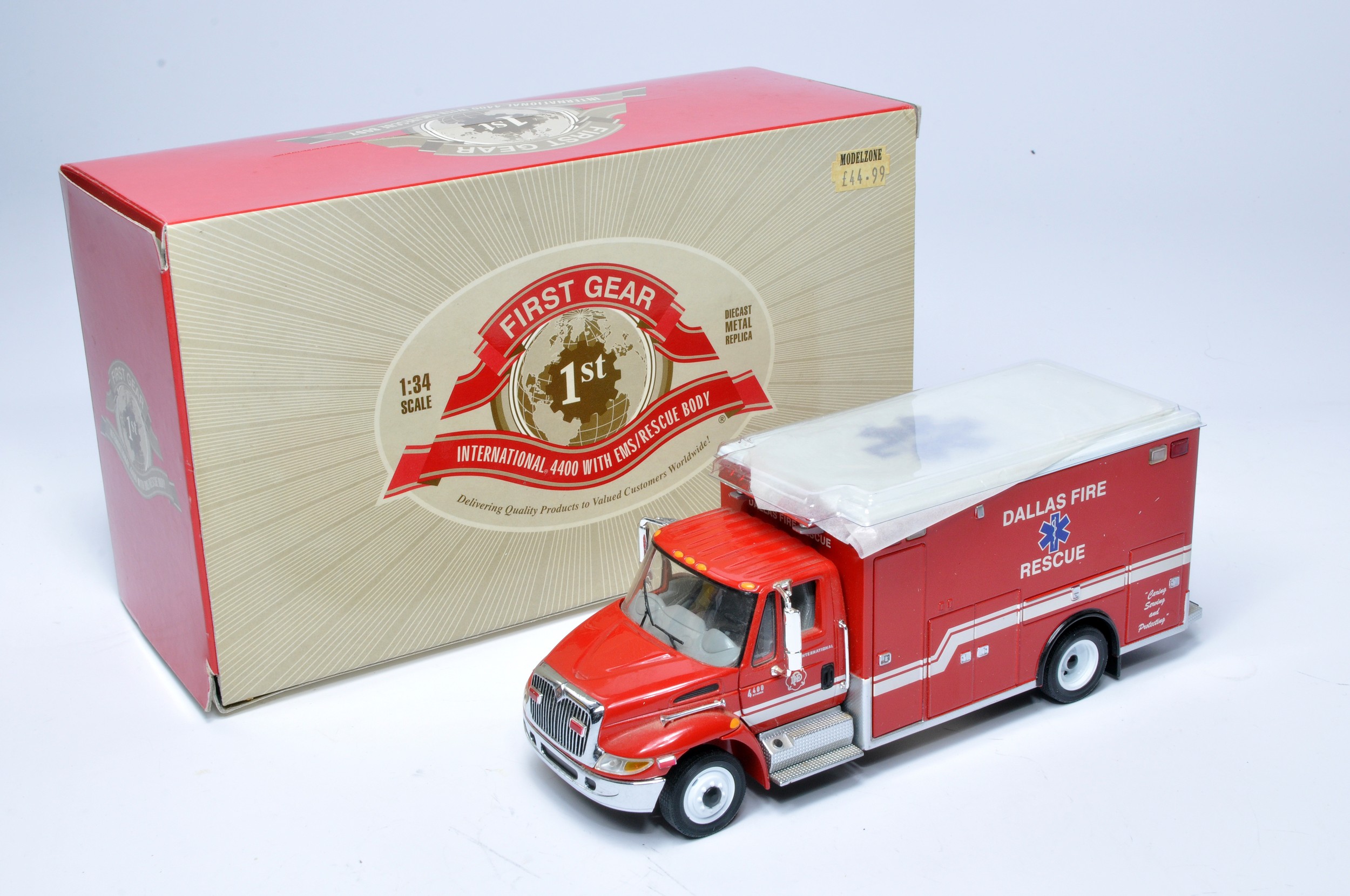 First Gear 1/34 Diecast model truck issue comprising International 4400 Rescue (Dallas). Excellent