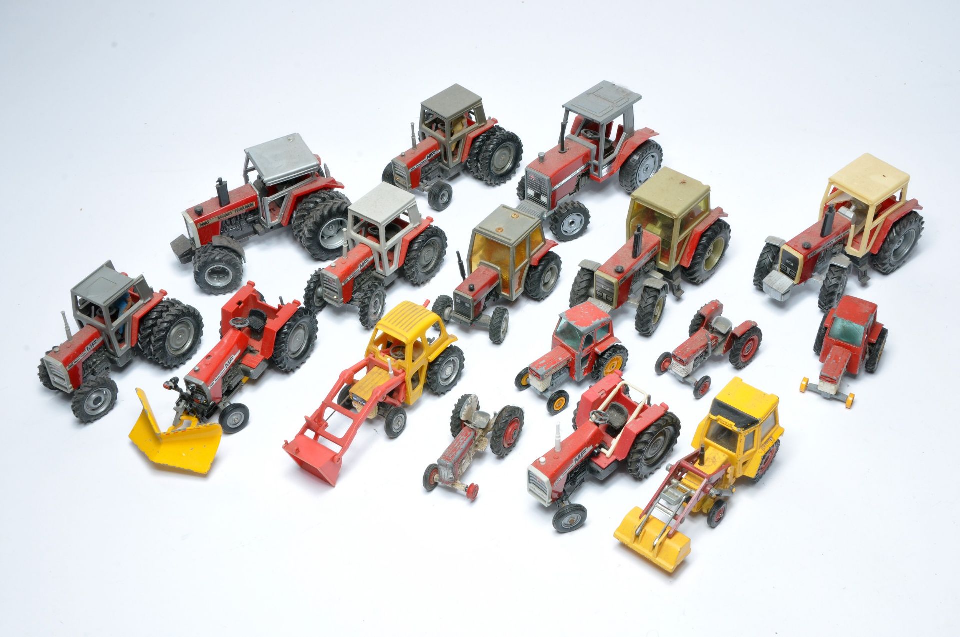 A large group of mostly Massey Ferguson Tractor models including older issues from Britains plus