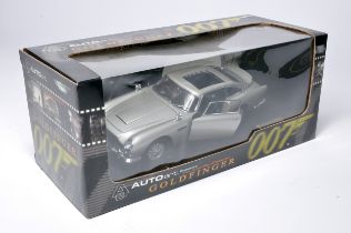 Autoart 1/18 diecast model car issue comprising James Bond 007 Aston Martin DB5. Likely displayed