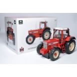 Universal Hobbies 1/16 diecast farm model issue comprising International 1455XL Tractor. Generally
