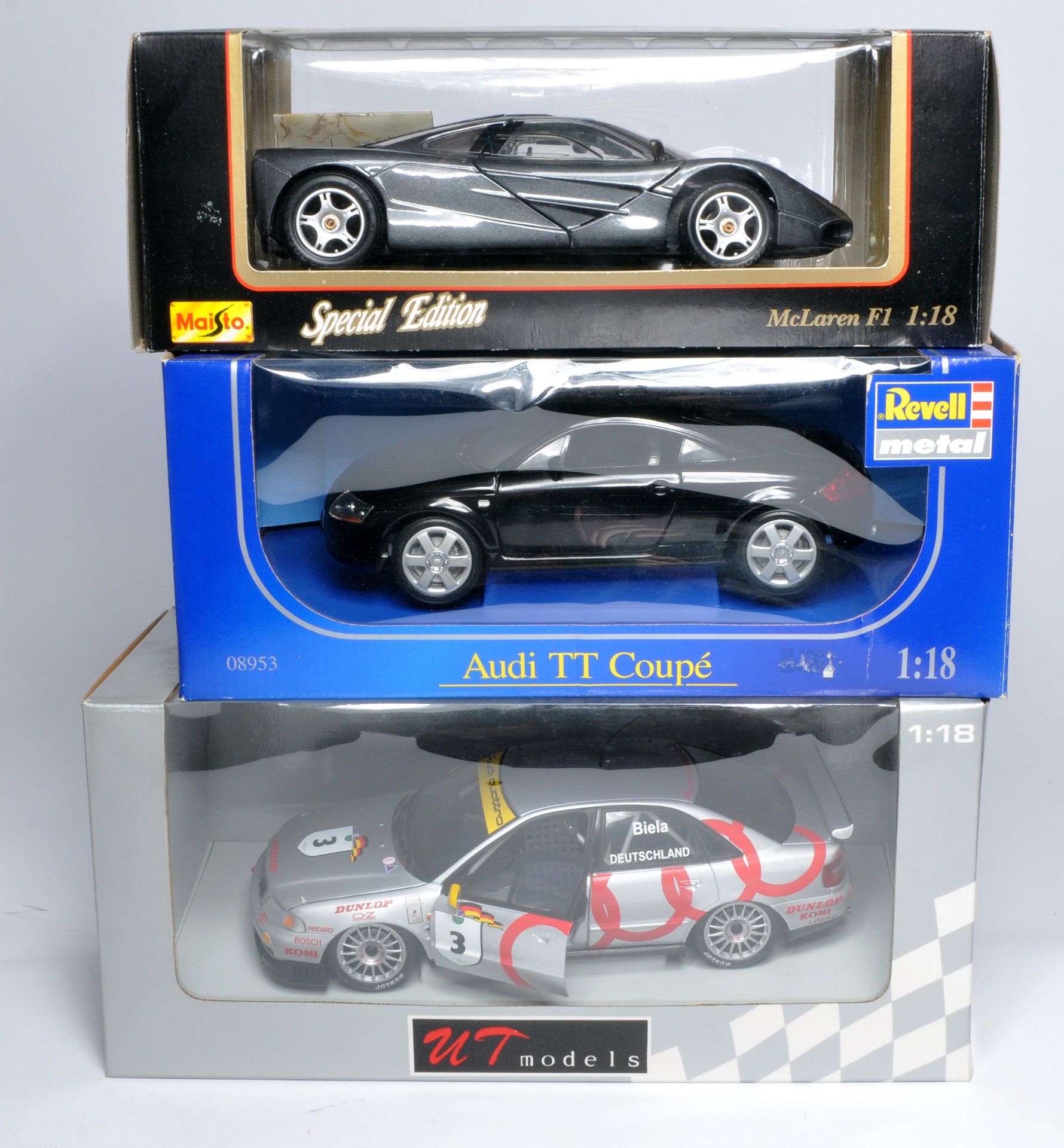 Trio of 1/18 diecast model cars from Maisto, Audi TT and UT Models. Look to be without obvious