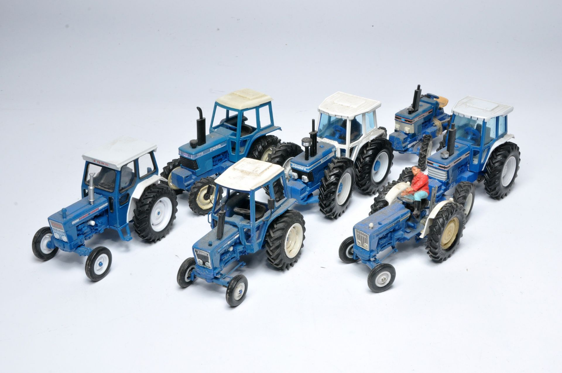 A group of Ford Tractor issues from mostly Britains as shown. Would benefit from cleaning.