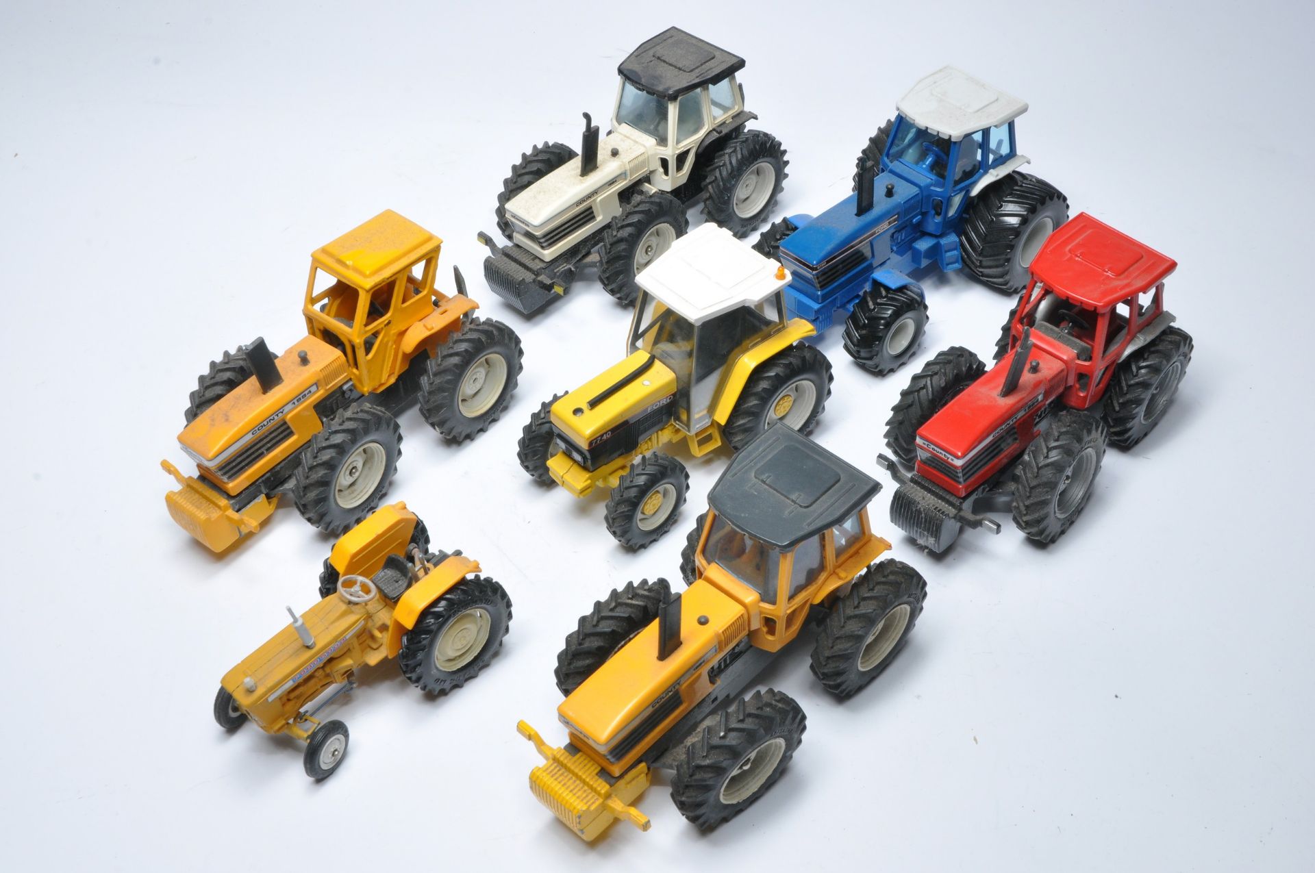 An assortment of mostly County themed tractor issues from mainly Britains plus other conversions. - Image 3 of 3