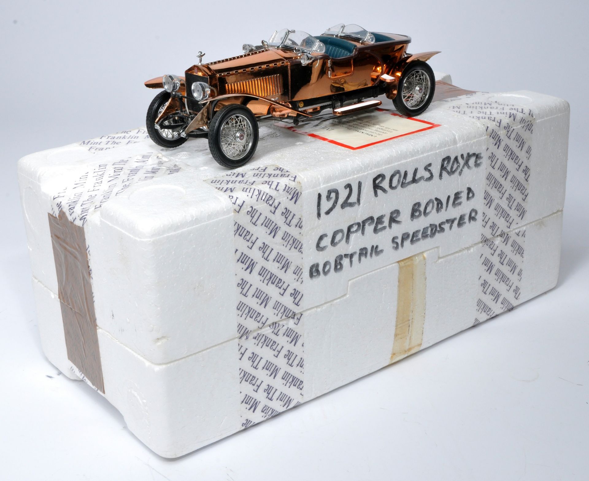 Franklin Mint 1/24 diecast model issue comprising 1921 Rolls Royce Copper Body. Looks to be