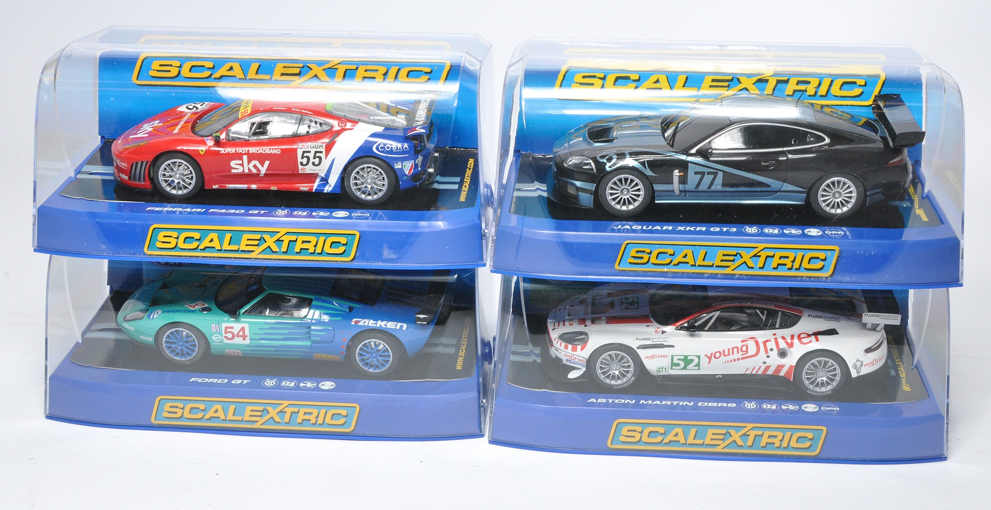 Scalextric slot car issues comprising Aston Martin DBR9, Ferrari F430 GT, Ford GT plus Jaguar XKR