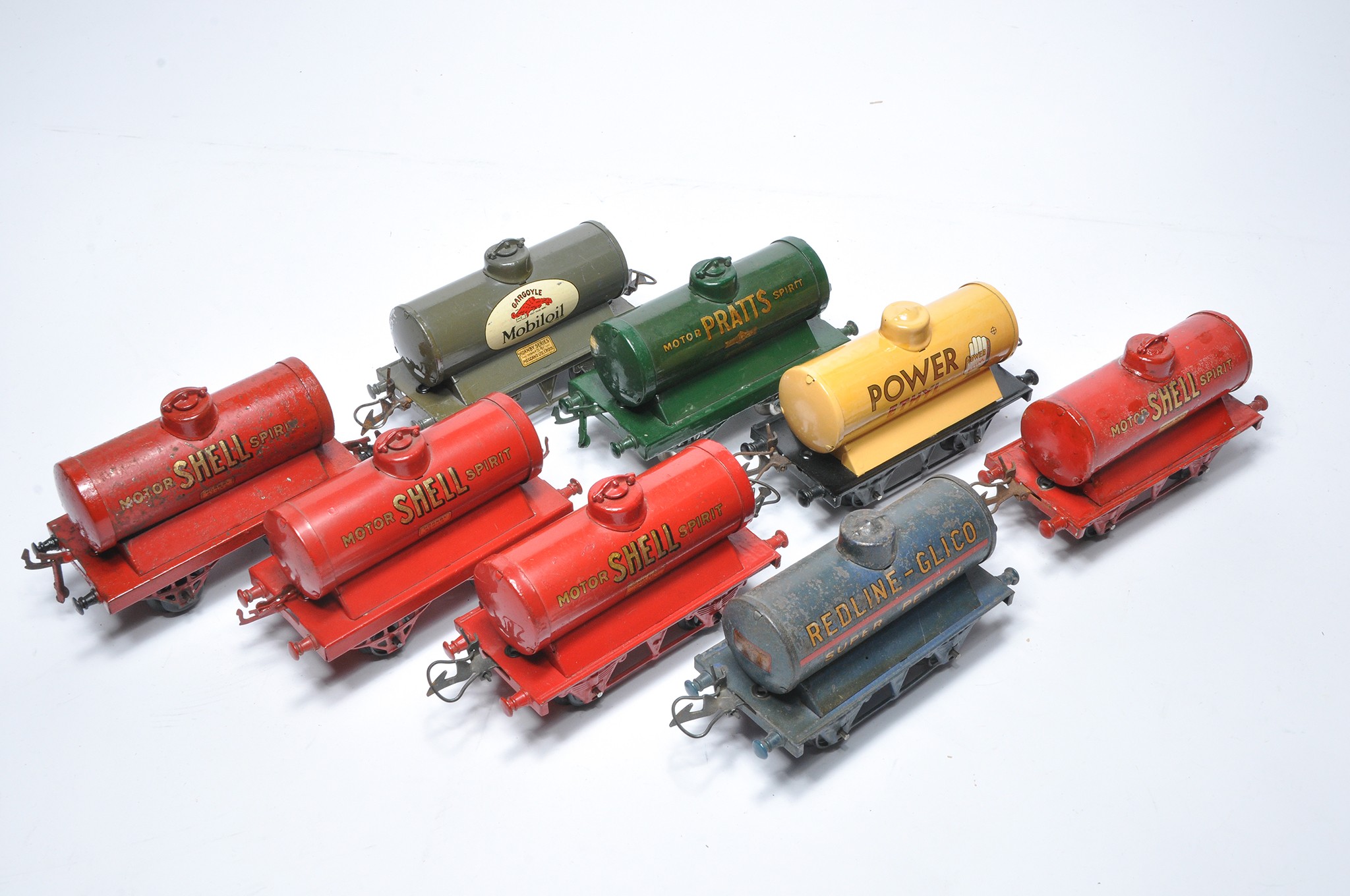 Hornby O Gauge Model Railway group of Eight Tank Wagons with various liveries as shown.