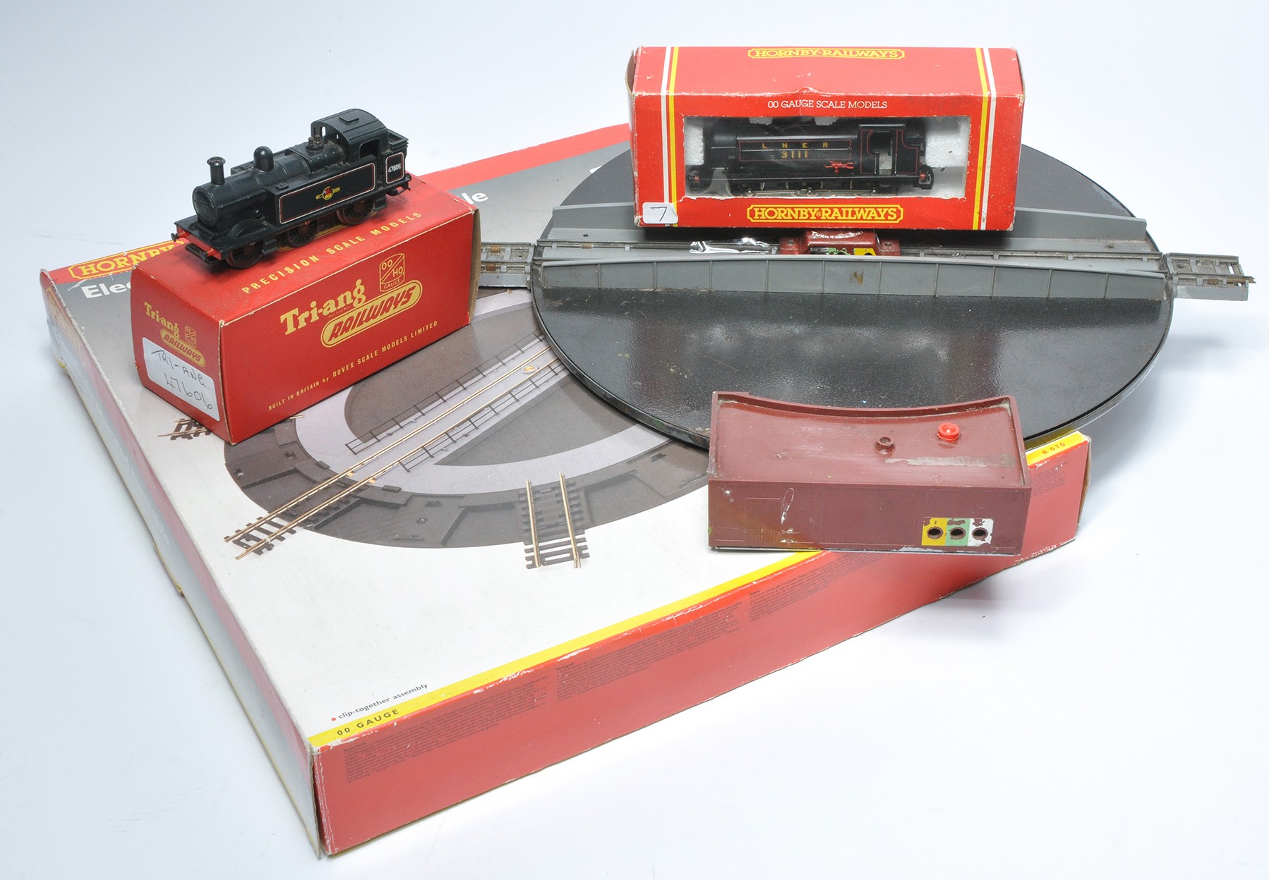 Model Railway issues comprising Electric Turntable, one other similar issue plus two tank