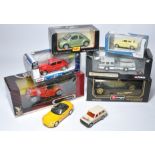 A group of six boxed diecast model vehicles in various scales from Burago, Corgi and others as