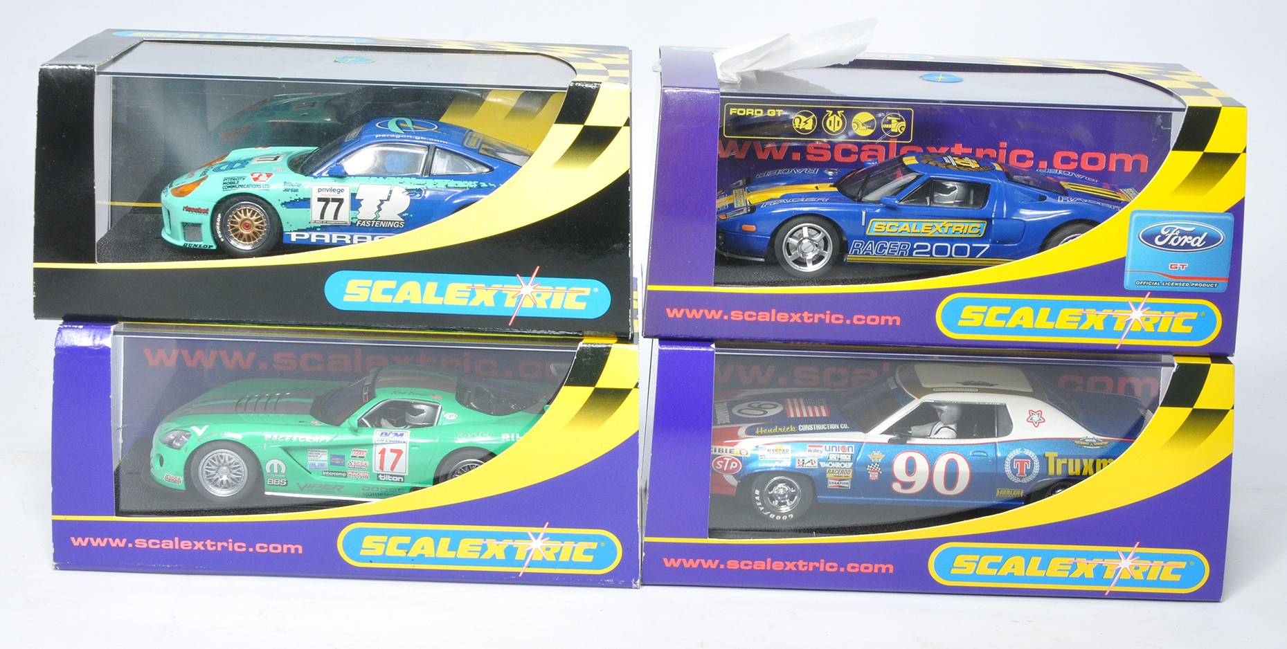 Scalextric slot car issues comprising Ford GT Scalextric Club 2007, Porsche 911 GT3R, Ford Gran