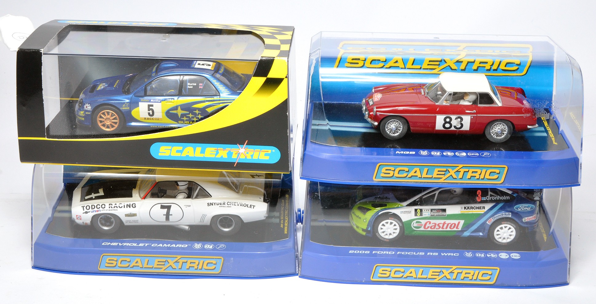 Scalextric slot car issues comprising Subaru Impreza WRC Works 2001, 2008 Ford Focus RS, MGB 1964