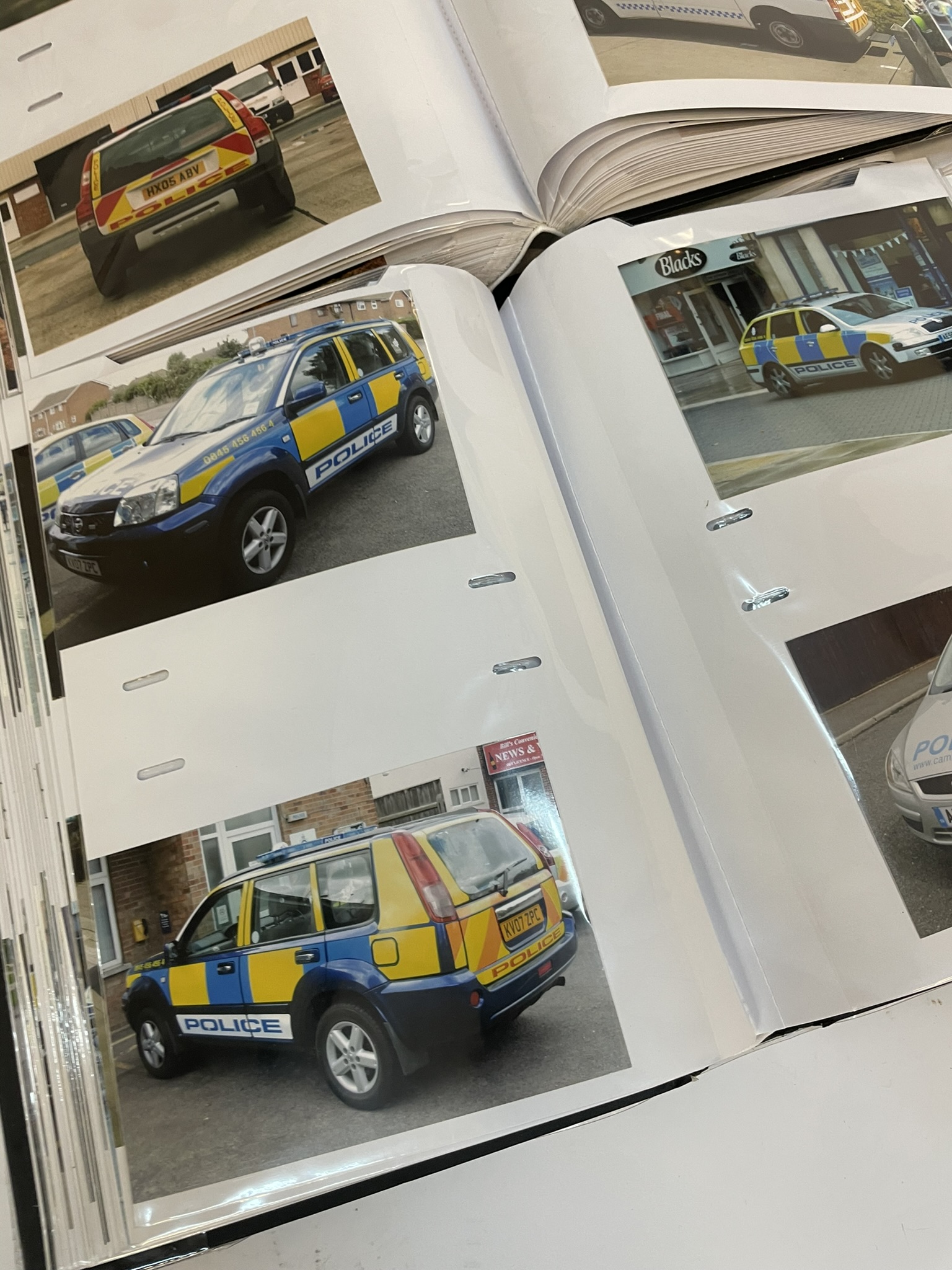 A large collection of police vehicle photographs comprising ten albums showcasing worldwide interest