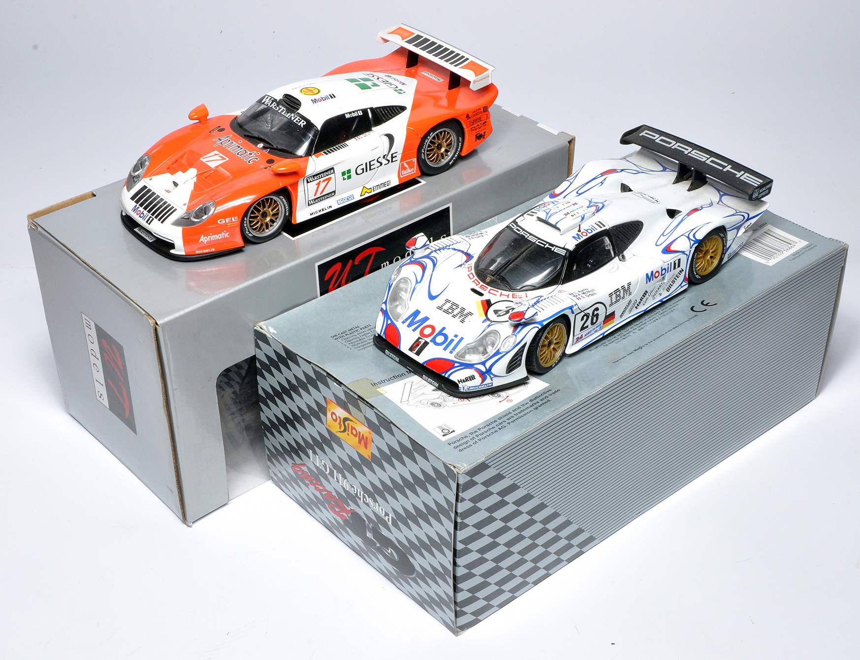 Duo of 1/18 diecast model racing cars (Le Mans) from Maisto and UT Models. Look generally good, with