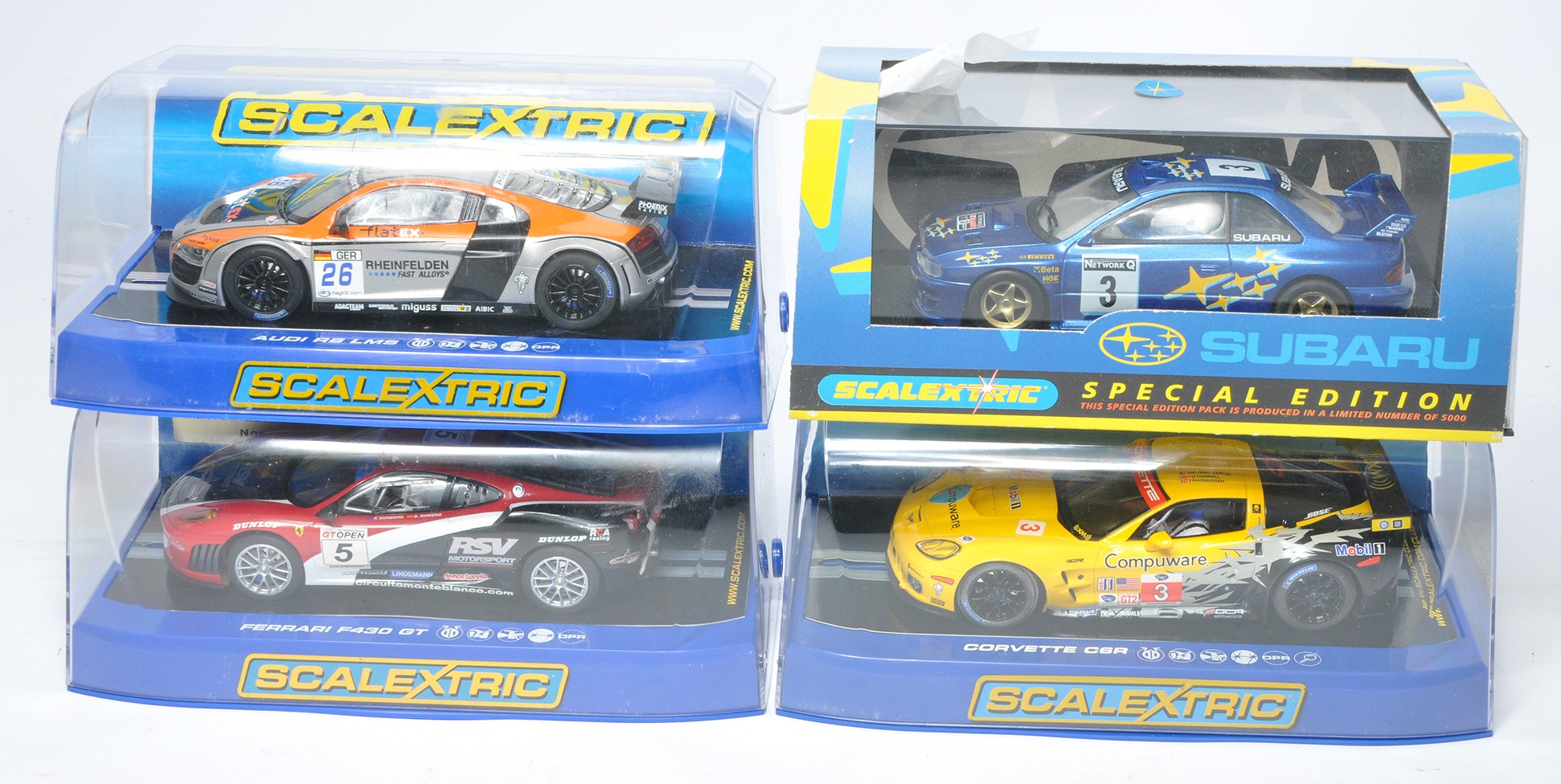 Scalextric slot car issues comprising Special Edition Subaru Impreza, Ferrari F430 GT, Audi R8 LMB