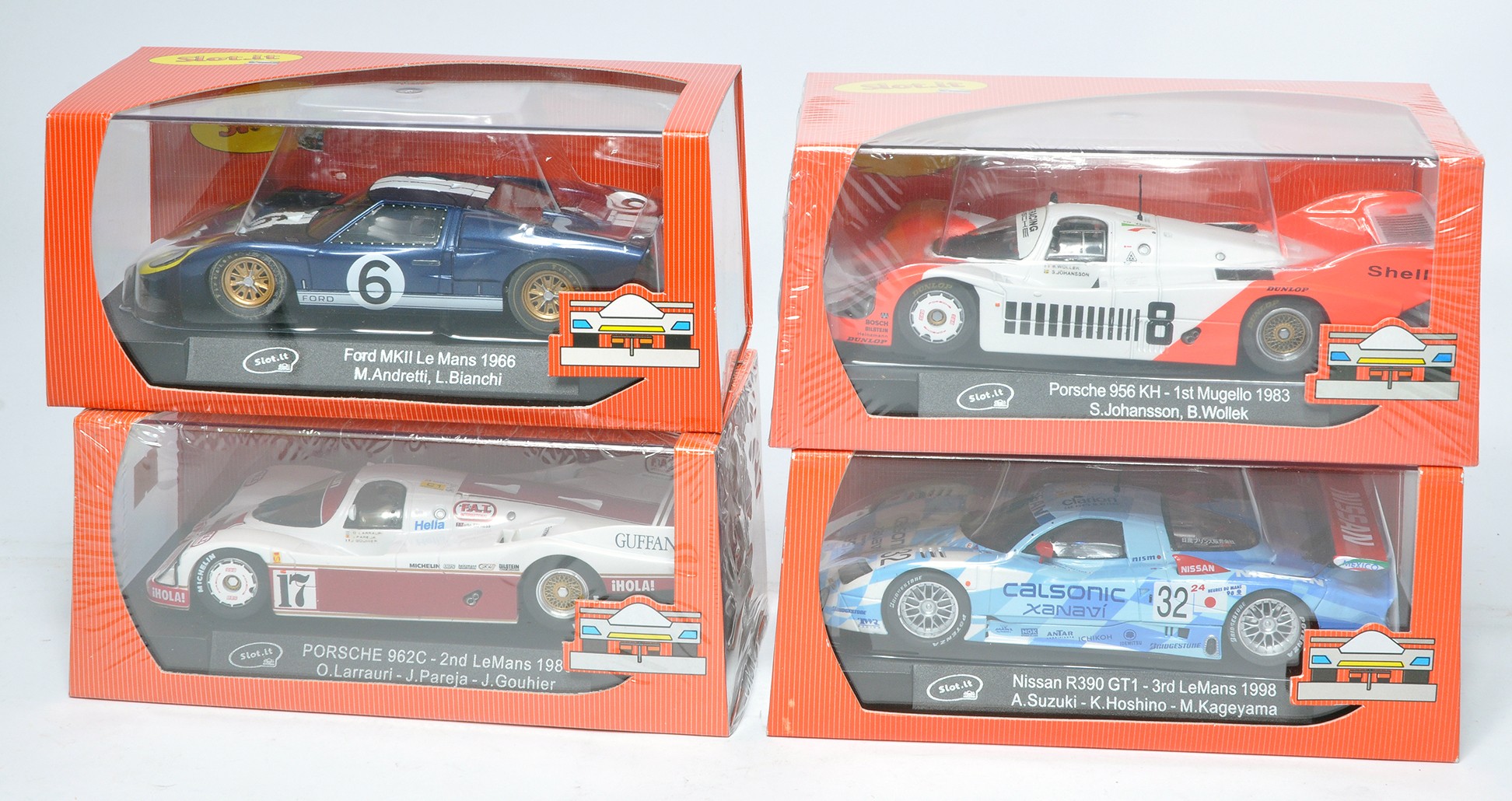 A group of four Slot.it slot car issues comprising Nissan R390 GT1, Porsche 956 KH, Ford MkII Le