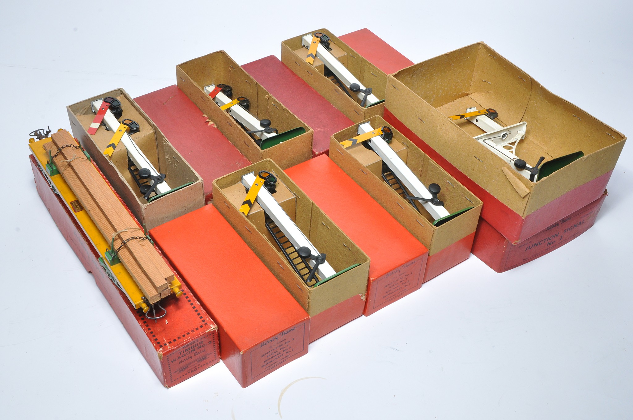 A quantity of Hornby O Gauge Signals with original boxes as shown. Plus Timber Wagon. Generally