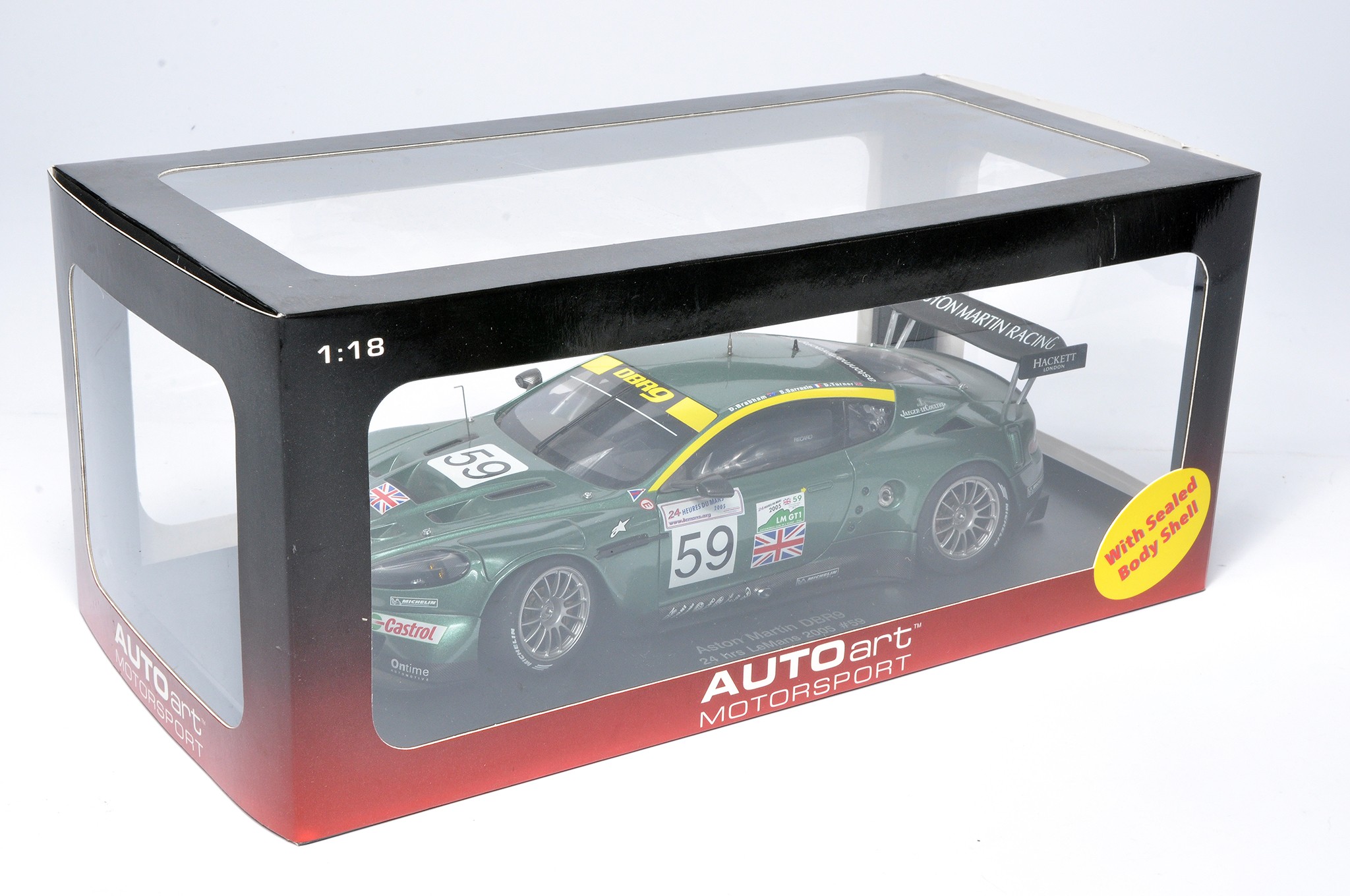Autoart 1/18 diecast model racing car issue comprising Aston Martin DBR9 Le Mans 2005. Looks to be