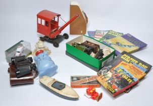 A misc assortment of vintage children's toys and books as shown in addition to other vintage items