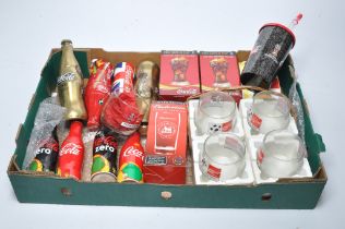 An interesting collection of Coca Cola Merchandise including promotional bottles (still sealed)