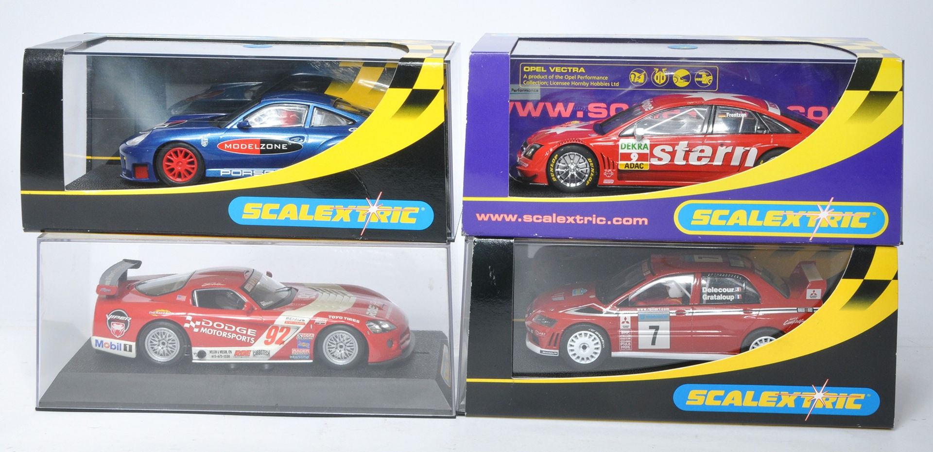 Scalextric slot car issues comprising Dodge Viper Competition Coupe, Porsche 911 GT3R Modelzone.