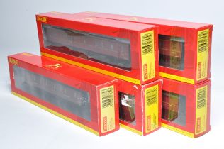 Hornby Model Railway comprising five coaches in Hawksworth Maroon etc. All look to be without