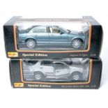 Maisto duo of 1/18 diecast model car issues in original boxes.
