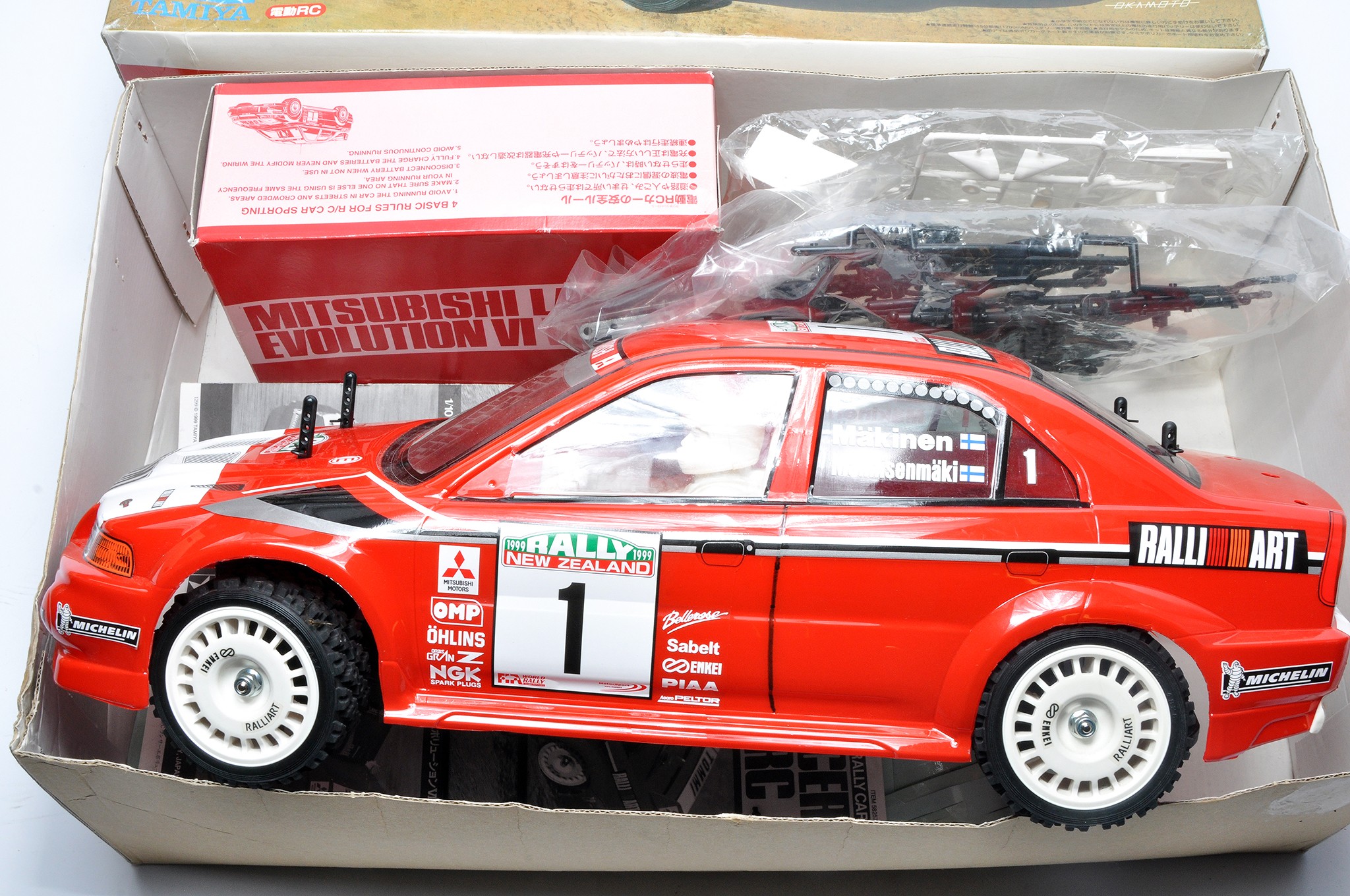Tamiya 1/10 RC 4WD High Performance Mitsubishi Rally Car. Assembled as shown, untested. - Image 2 of 2