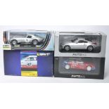 A group of four slot car issues comprising Autoart Nissan Fairlady Z, Citroen Xsara WRC 2004, Revell