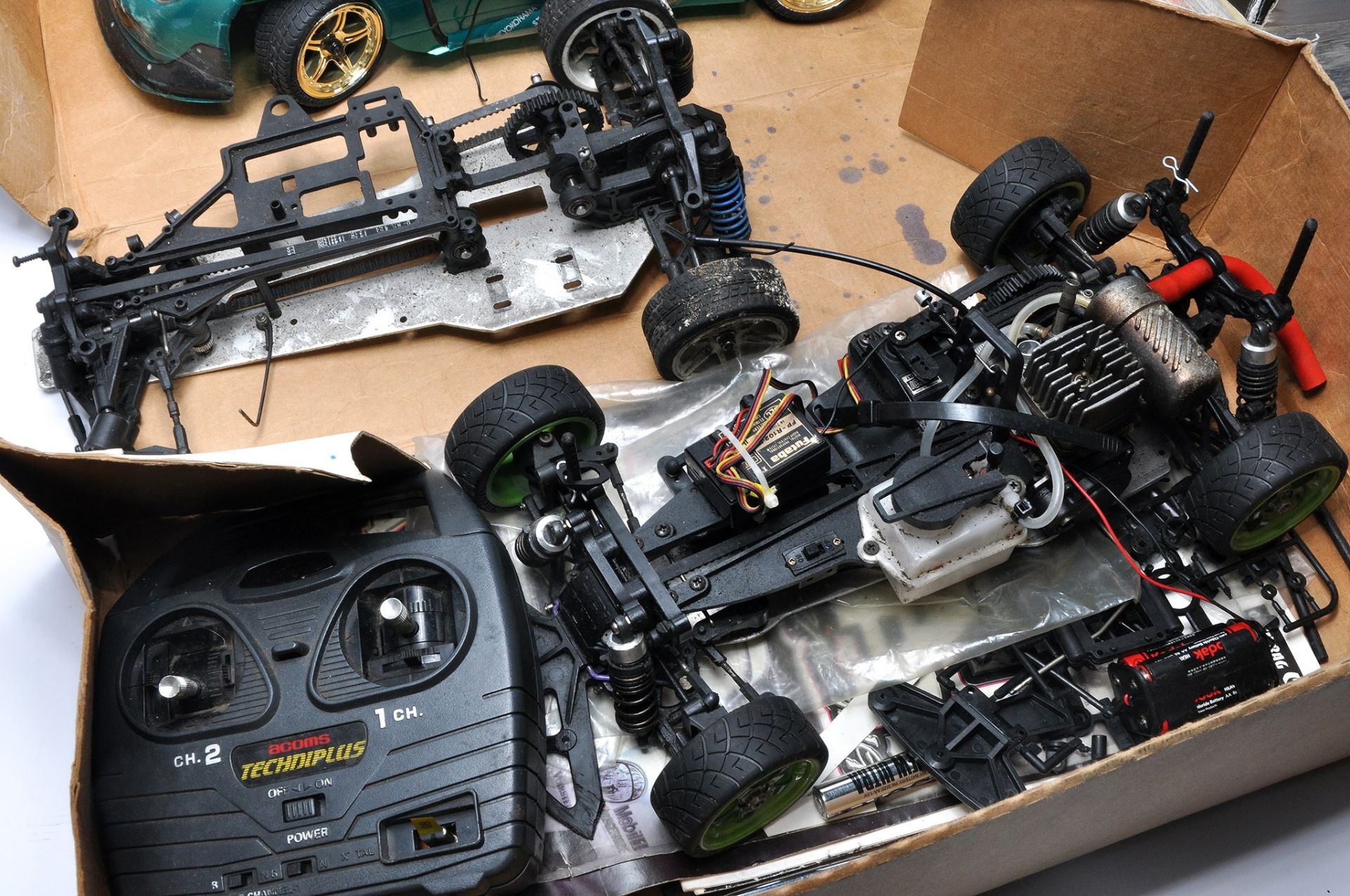 A group of High Performance Radio Control Car items including car chassis and shells and other items - Image 2 of 3