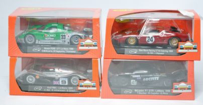 A group of four Slot.it slot car issues comprising Alan Mann Racing GT40 Sebring 1968, McLaren F1
