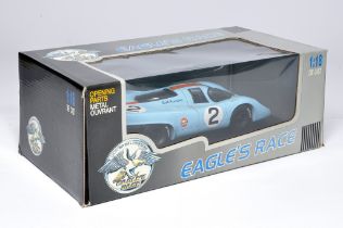 Universal Hobbies 1/18 diecast model racing car issue comprising Porsche Gulf Racing. Looks to be
