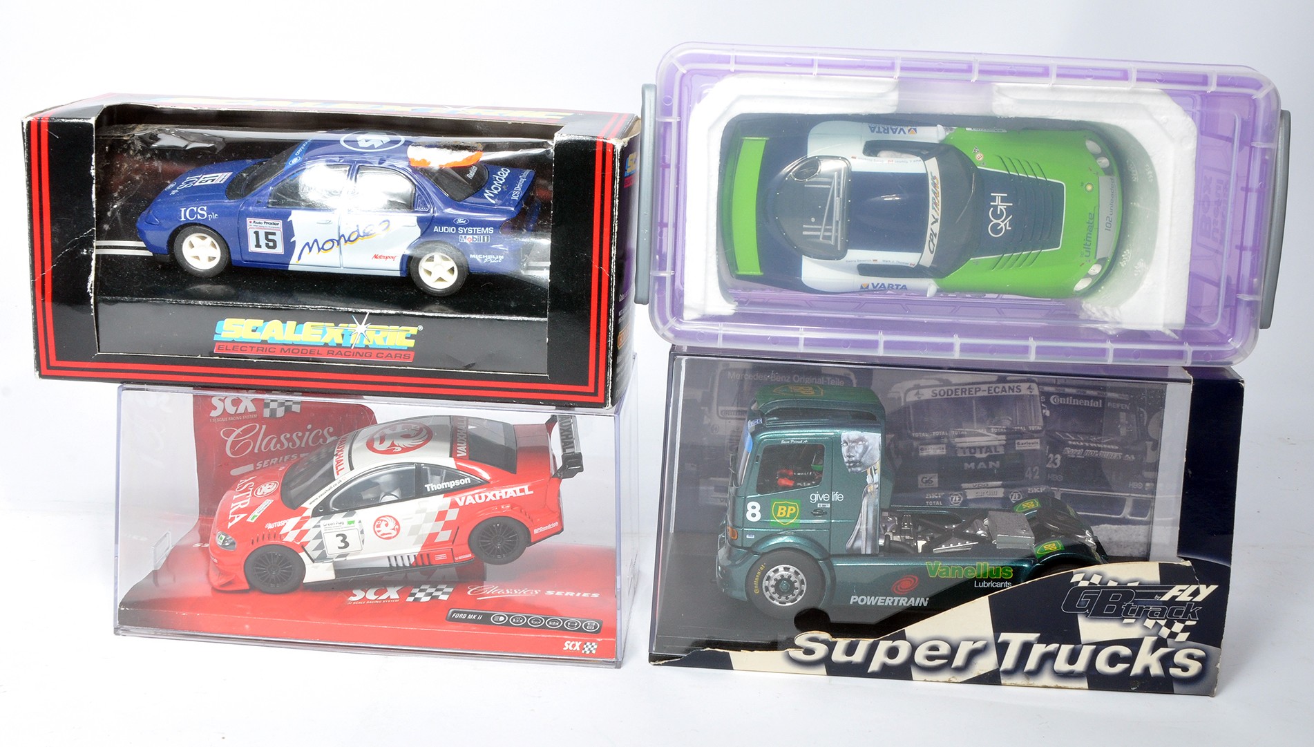 Slot car issues comprising Fly GB Track Mercedes Benz Atego 2000, Scalextric Ford Cosworth Mondeo (