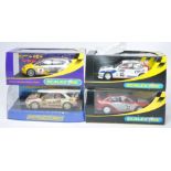 Scalextric slot car issues comprising Subaru Impreza WRC, Seat Leon BTCC, Mitsubishi Lancer plus