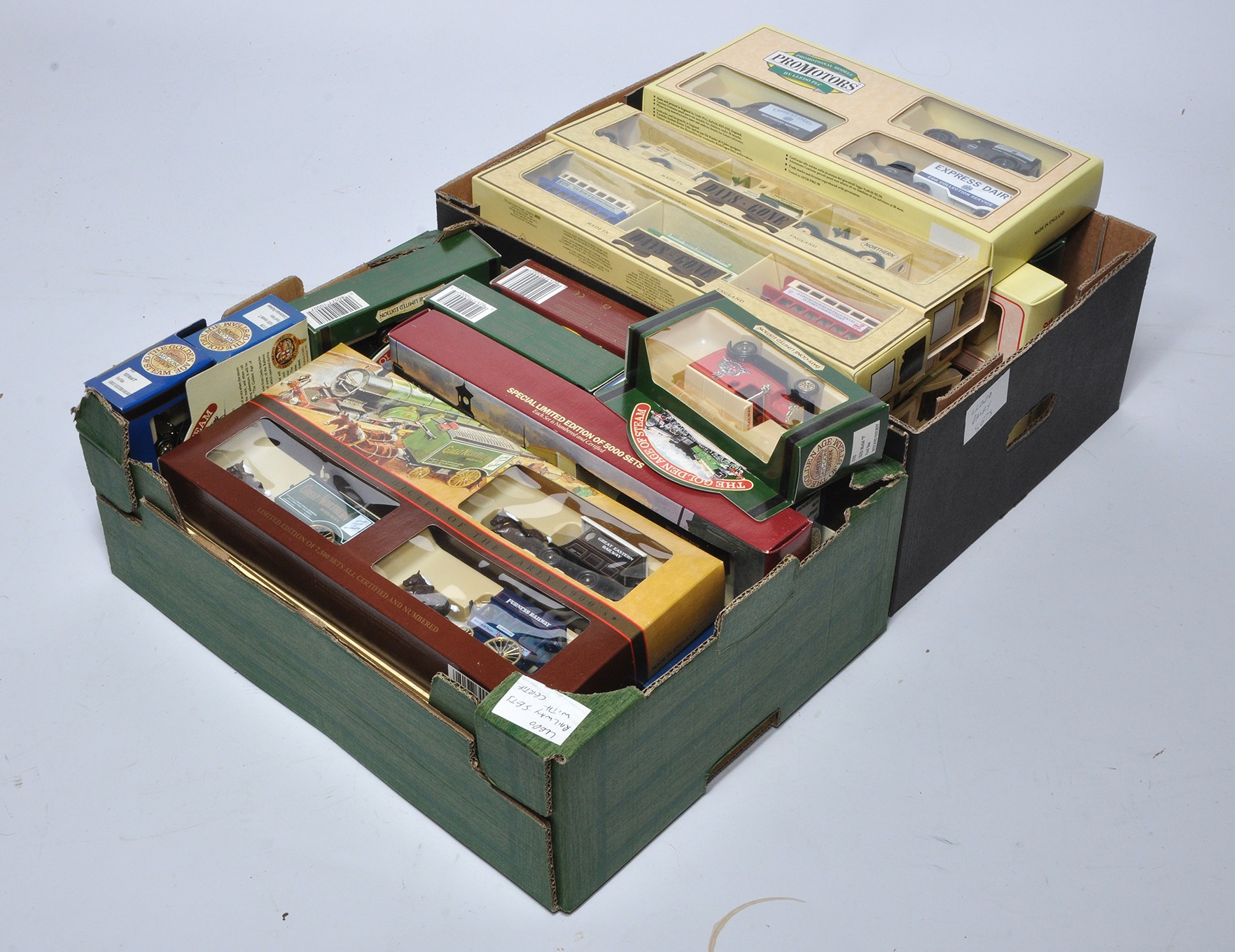 A selection of Lledo Days Gone Promotional Commercial Diecast Vehicles Sets including a tray