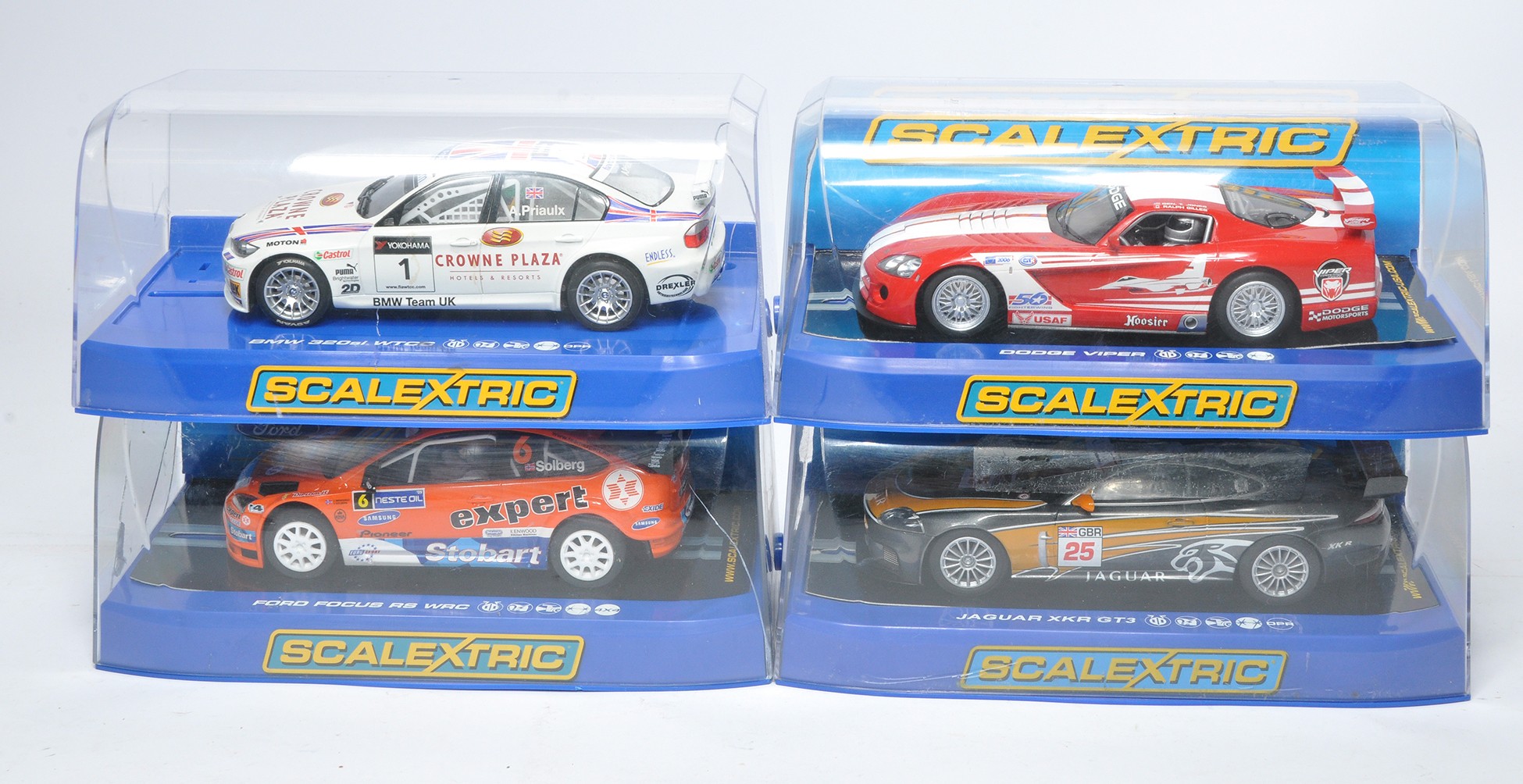 Scalextric slot car issues comprising Jaguar XKR GT3, BMW 320si WTCC, Ford Focus RS WRC (cracks to